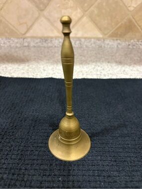 vintage brass hand-held bell